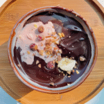 Magic Shell Smoothie Bowl with cracked chocolate top